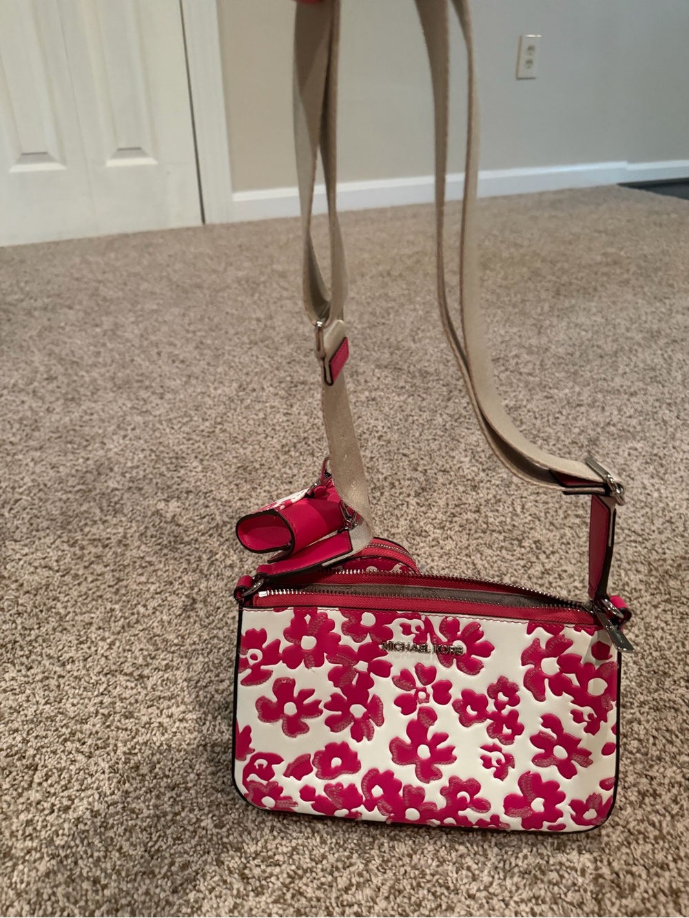 New Without Tags Michael Kors pink floral cross body with 2 attachments!